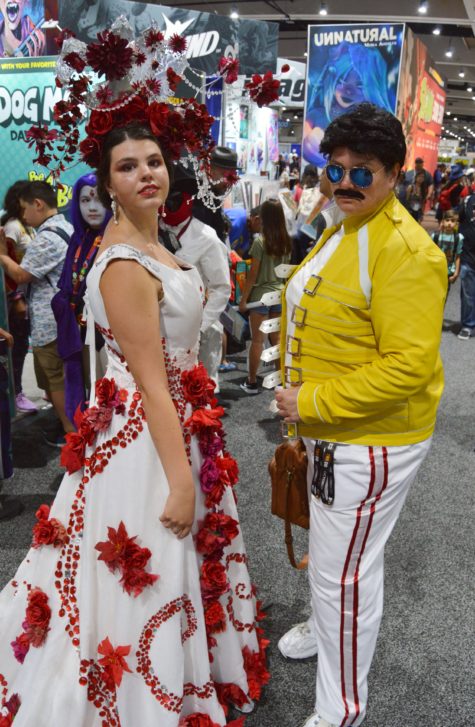 Freddy Mercury and red floral dress